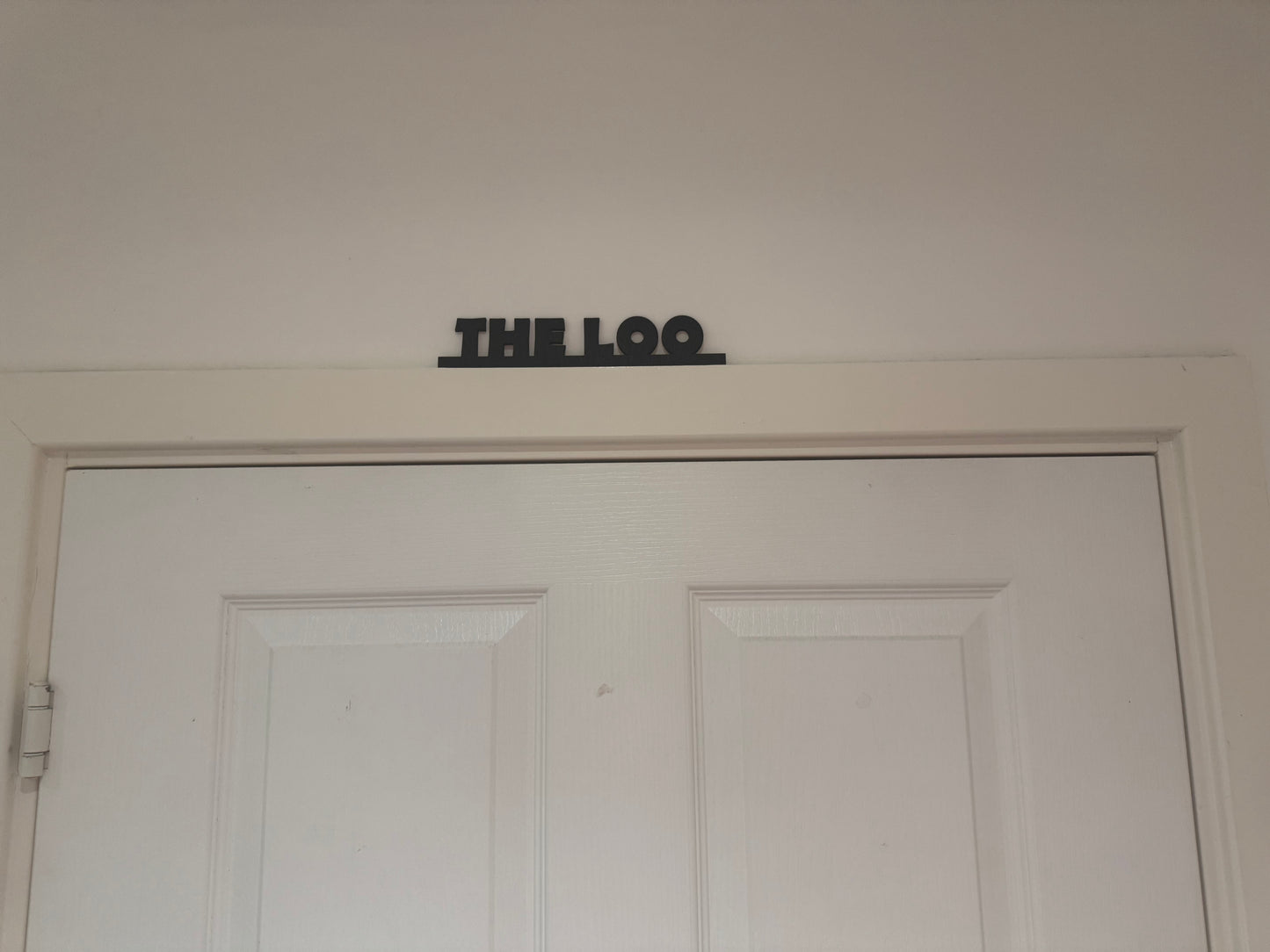 The loo | sign | Indoor sign