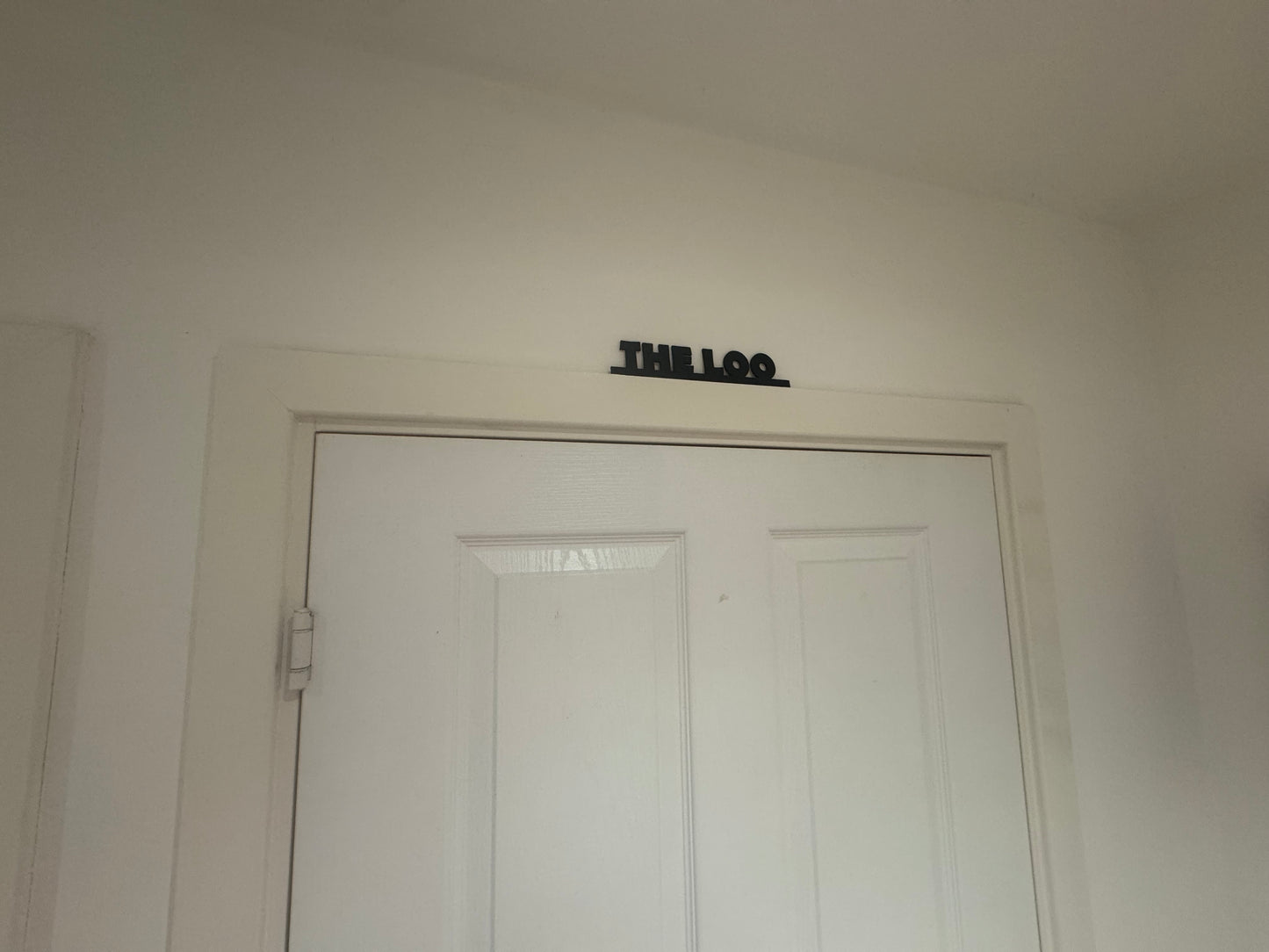The loo | sign | Indoor sign