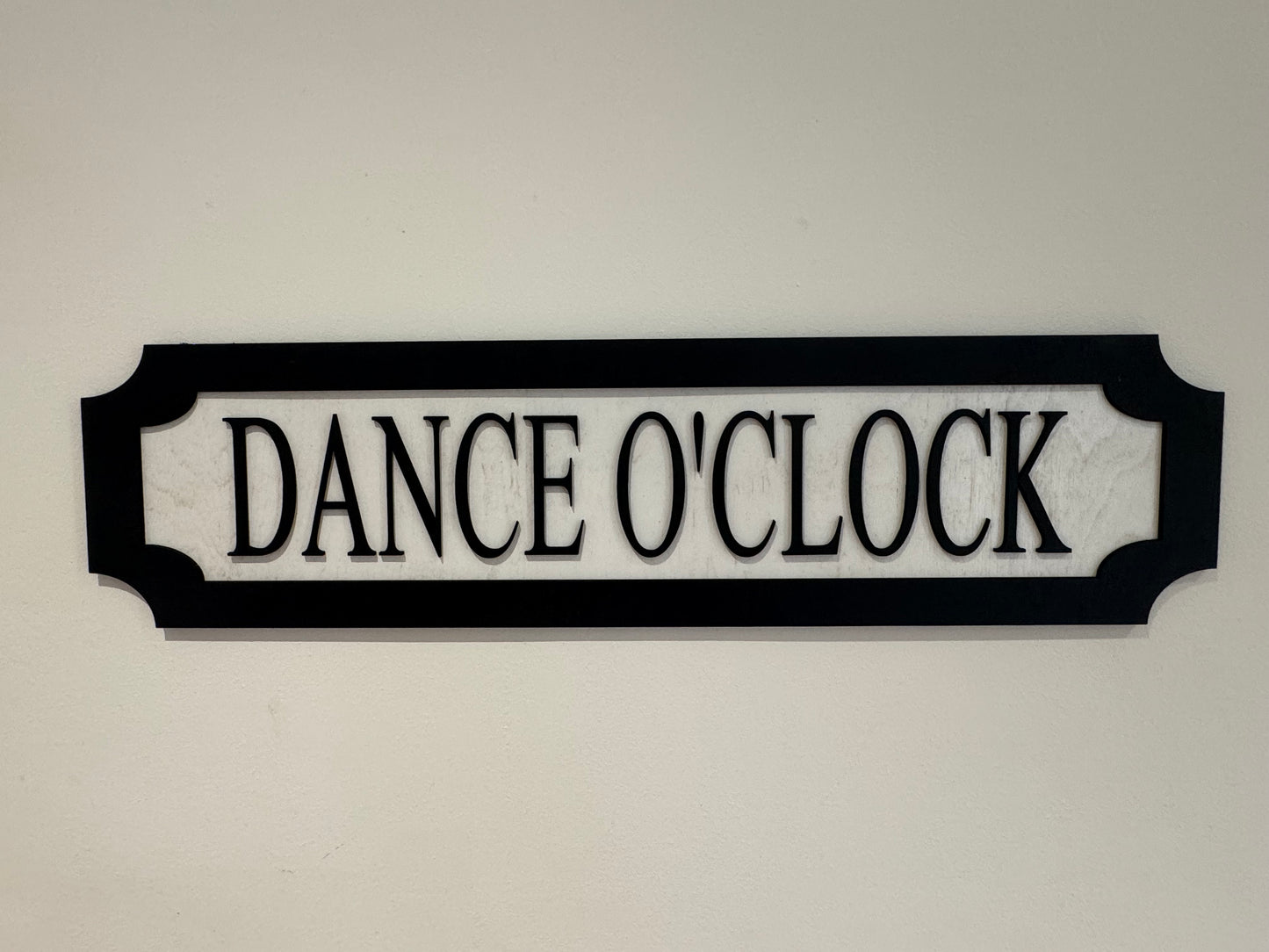 Dance O'clock | sign | Indoor sign