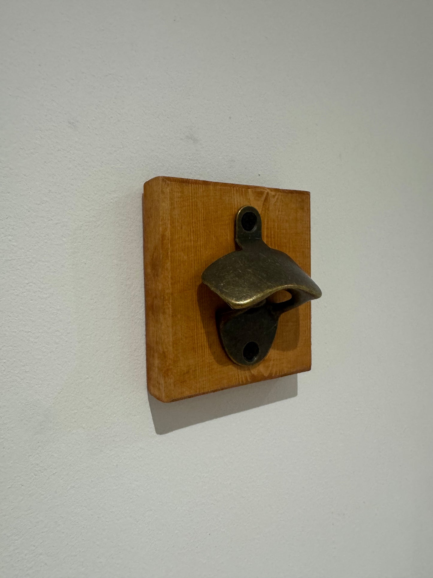 Teak stain bottle opener
