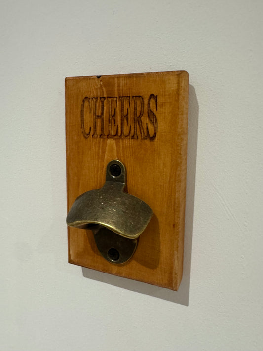 A teak stain bottle opener - Cheers