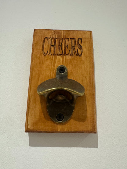 A teak stain bottle opener - Cheers