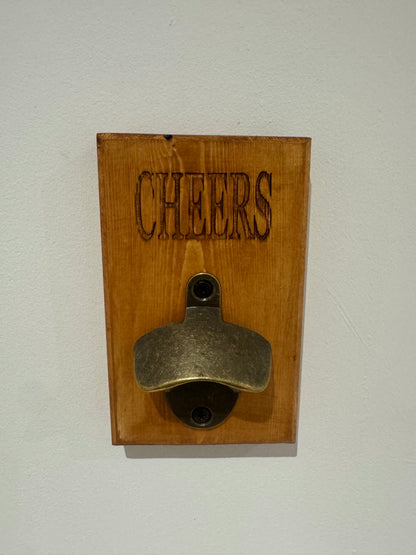 A teak stain bottle opener - Cheers
