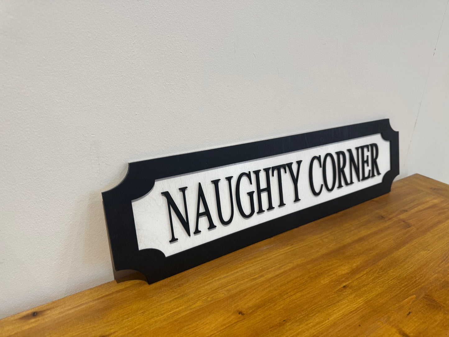 Naughty corner | sign | Indoor sign