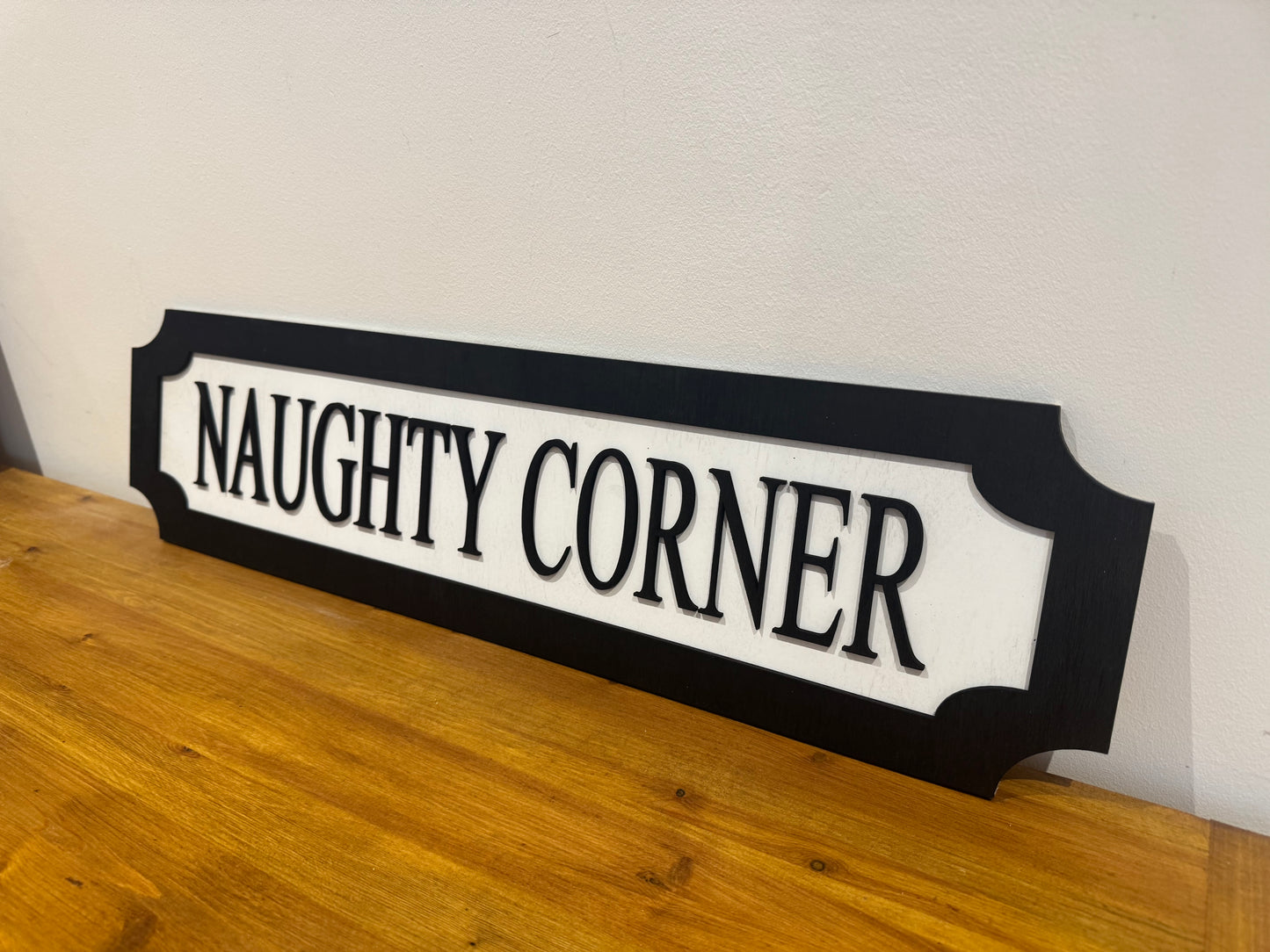 Naughty corner | sign | Indoor sign