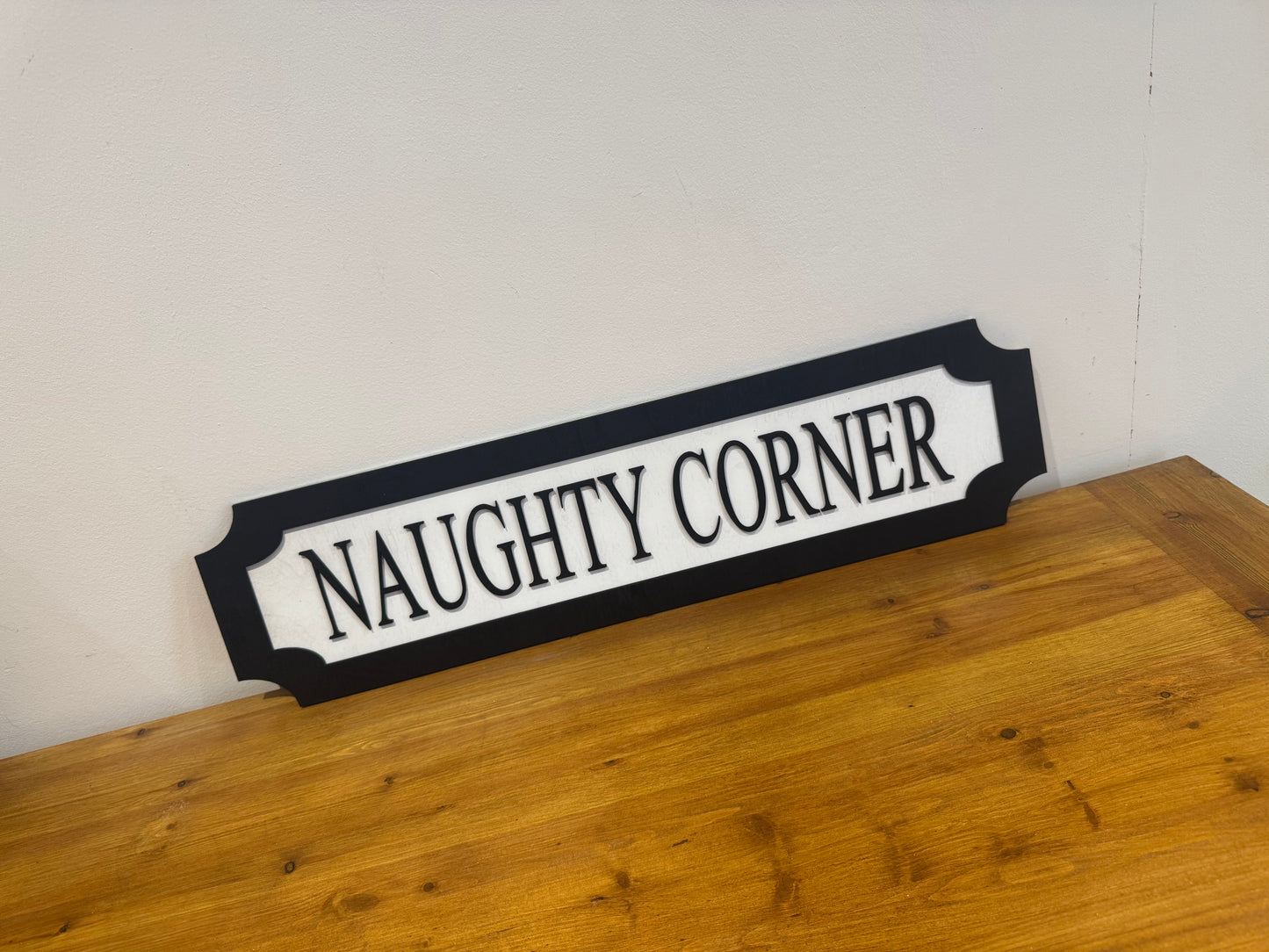 Naughty corner | sign | Indoor sign