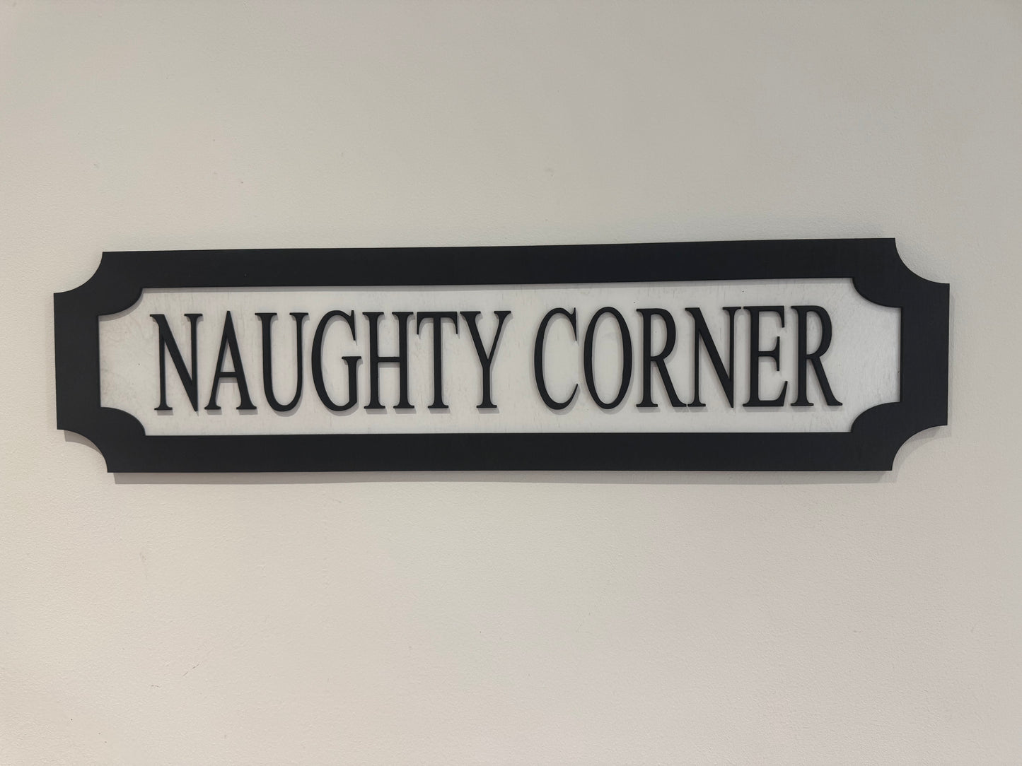 Naughty corner | sign | Indoor sign