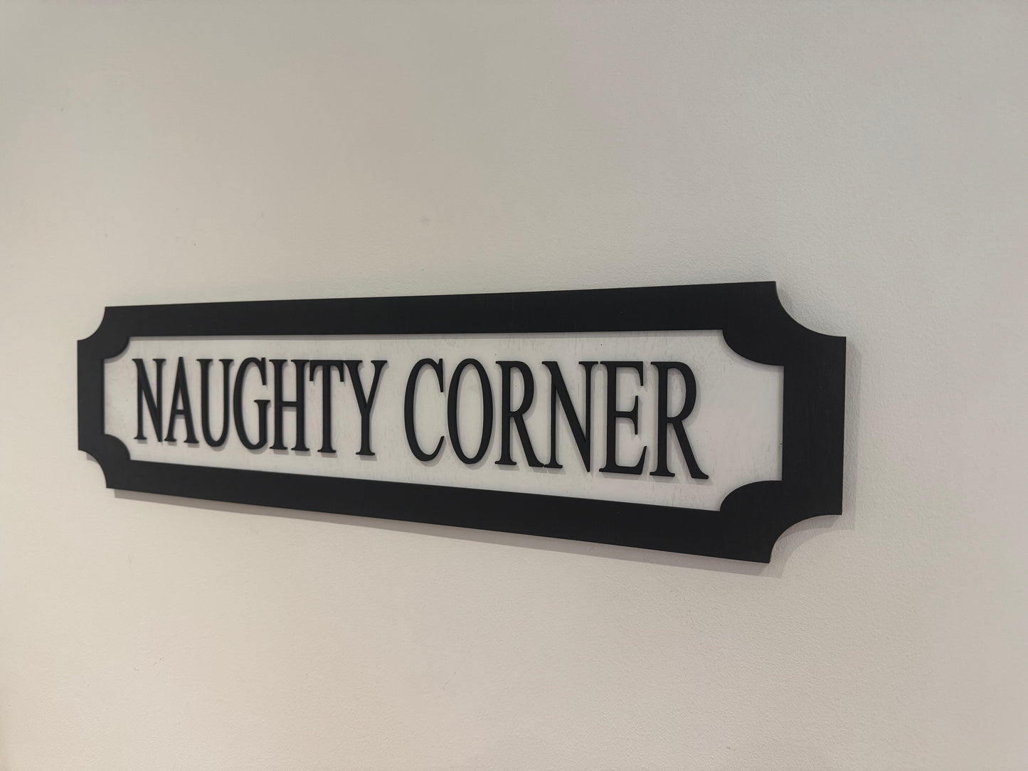 Naughty corner | sign | Indoor sign