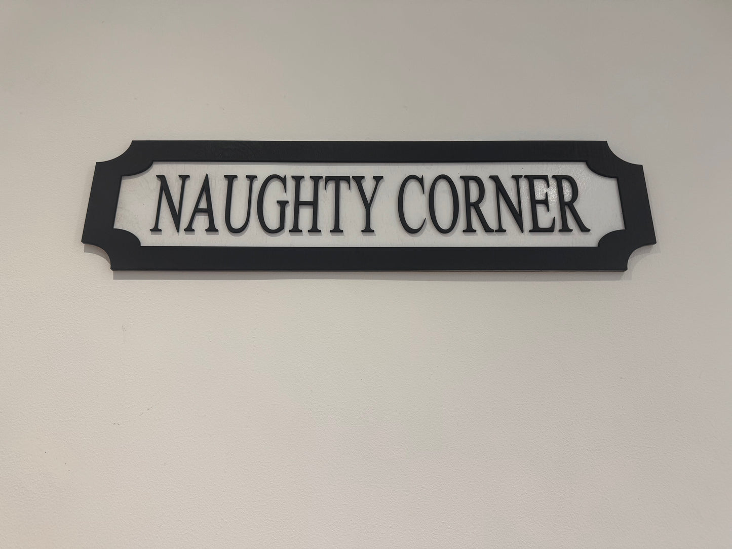 Naughty corner | sign | Indoor sign