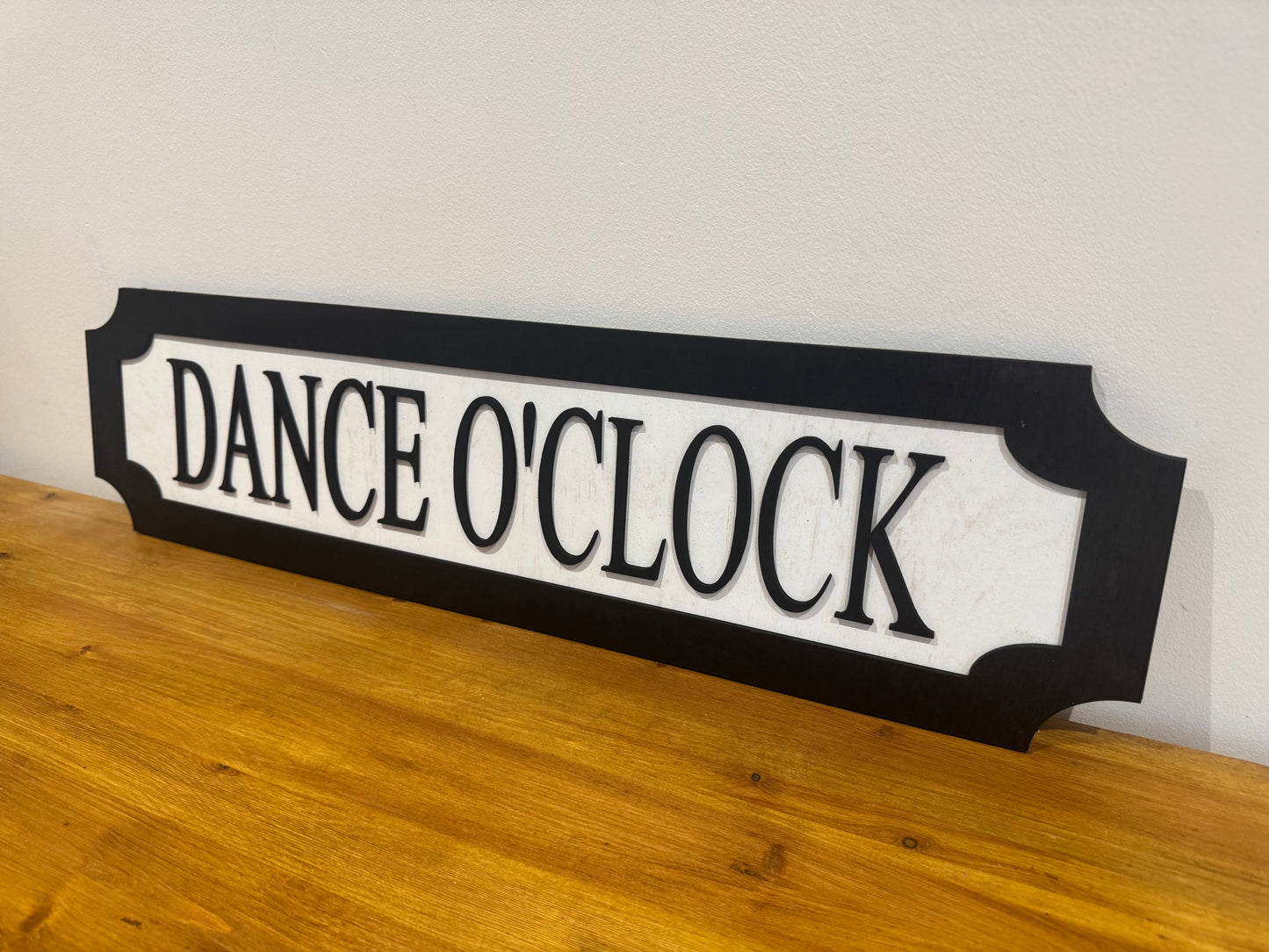 Dance O'clock | sign | Indoor sign