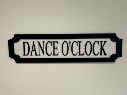 Dance O'clock | sign | Indoor sign