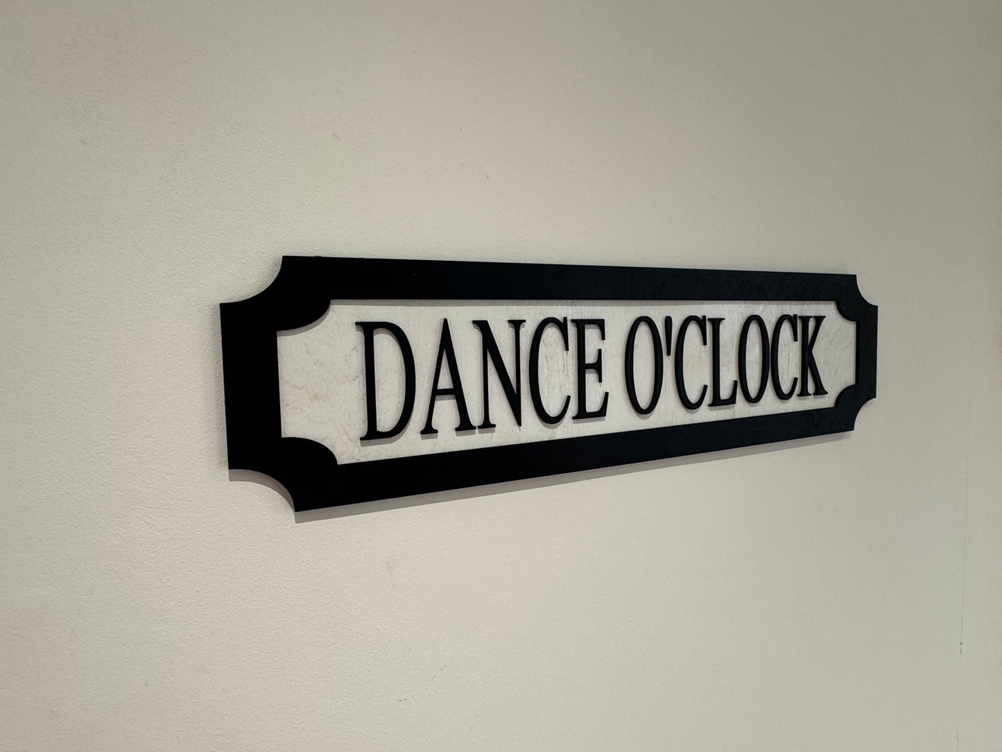 Dance O'clock | sign | Indoor sign